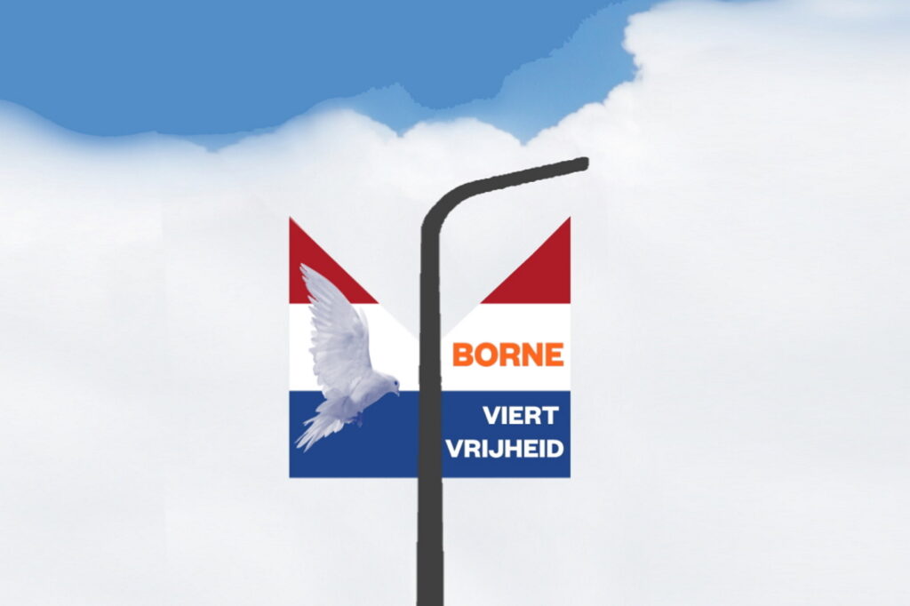 Straatlantaarnvlag viert vrijheid duovlag met NL kleuren